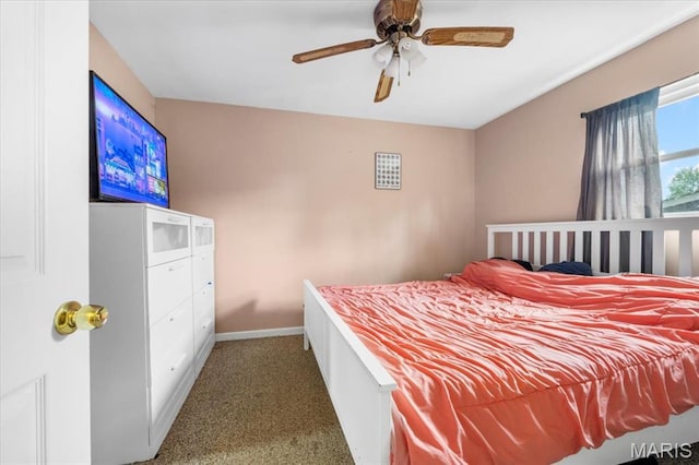 2270 Grants Pkwy, Florissant, MO 63031 - carpeted bedroom with baseboards and ceiling fan