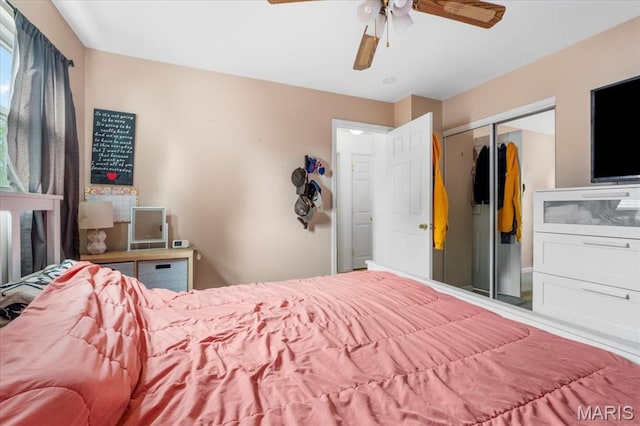 2270 Grants Pkwy, Florissant, MO 63031 - bedroom with a closet and a ceiling fan