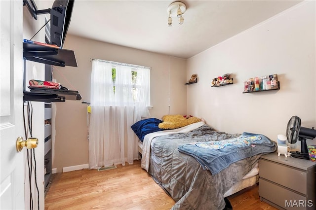 2270 Grants Pkwy, Florissant, MO 63031 - bedroom featuring wood finished floors