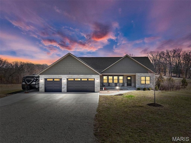 25 Gregory Michael Ln, Wright City, MO 63390 - view of front of home featuring concrete driveway, stone siding, a garage, and a front yard