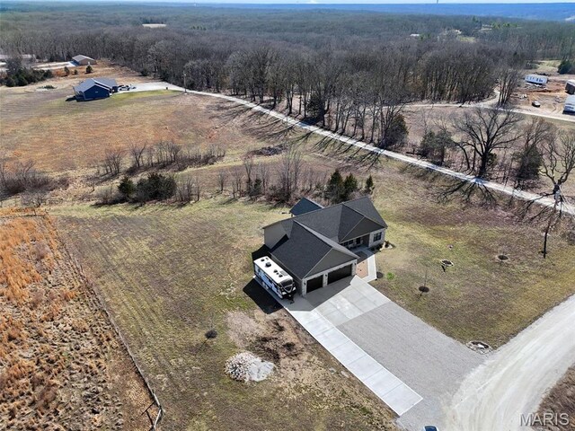 25 Gregory Michael Ln, Wright City, MO 63390 - view of rural area with a heavily wooded area