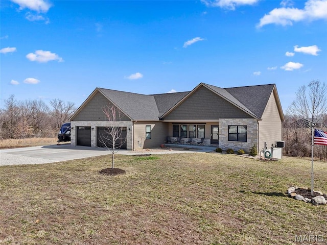 25 Gregory Michael Ln, Wright City, MO 63390 - view of front facade featuring stone siding, concrete driveway, a garage, and a front yard