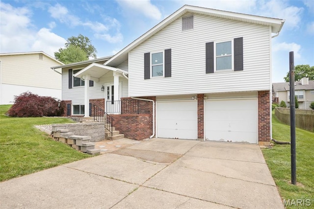 10 Brooker Ct, Saint Peters, MO 63376 - bi-level home with brick siding, a garage, and driveway