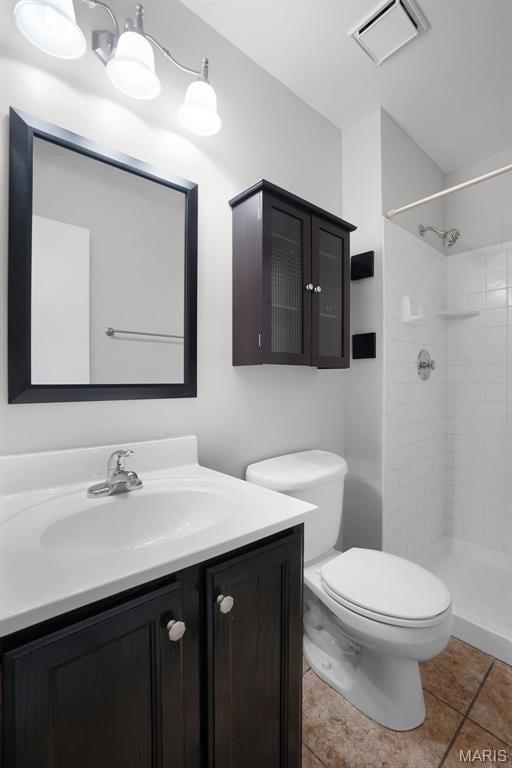 10 Brooker Ct, Saint Peters, MO 63376 - full bath with toilet, vanity, a tile shower, and tile patterned floors