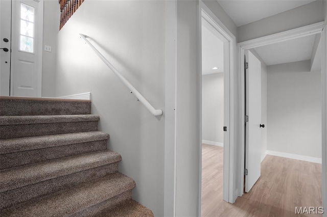 10 Brooker Ct, Saint Peters, MO 63376 - stairs featuring wood finished floors and baseboards