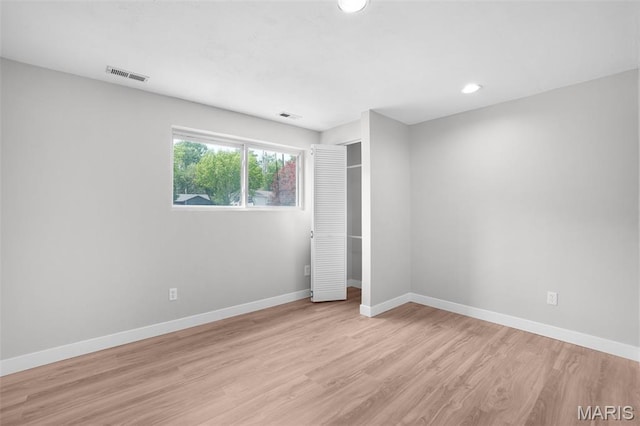 10 Brooker Ct, Saint Peters, MO 63376 - unfurnished bedroom with light wood-style flooring, baseboards, and recessed lighting