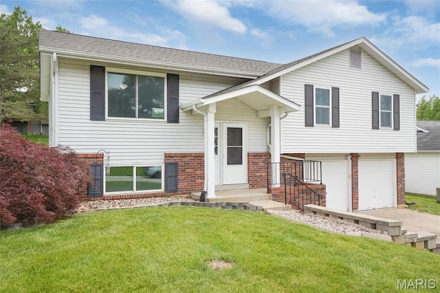 10 Brooker Ct, Saint Peters, MO 63376 - raised ranch featuring brick siding, a front yard, an attached garage, driveway, and roof with shingles