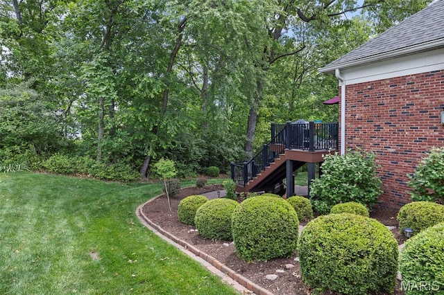26 Windcastle Dr, Saint Charles, MO 63304 - view of grassy yard featuring stairway and a wooden deck