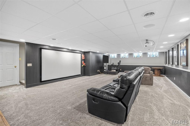 cinema room featuring a drop ceiling, carpet, and recessed lighting
