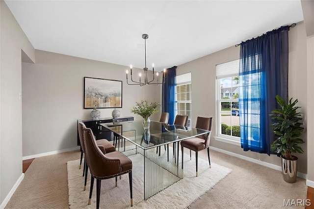 12 Lambeth Ln Unit 11B, Dardenne Prairie, MO 63368 - carpeted dining room with a chandelier and baseboards