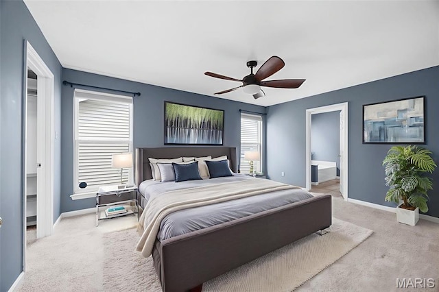12 Lambeth Ln Unit 11B, Dardenne Prairie, MO 63368 - bedroom with carpet flooring, baseboards, a ceiling fan, and ensuite bath