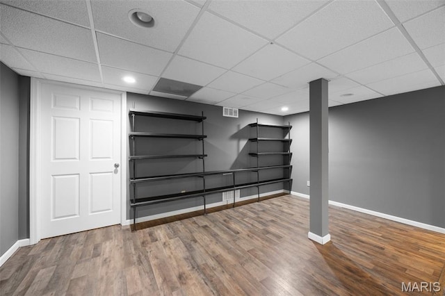 12 Lambeth Ln Unit 11B, Dardenne Prairie, MO 63368 - finished below grade area with wood finished floors, baseboards, a drop ceiling, and recessed lighting