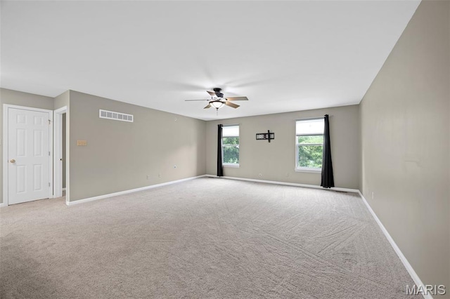 12 Lambeth Ln Unit 11B, Dardenne Prairie, MO 63368 - spare room with a ceiling fan, carpet, and baseboards
