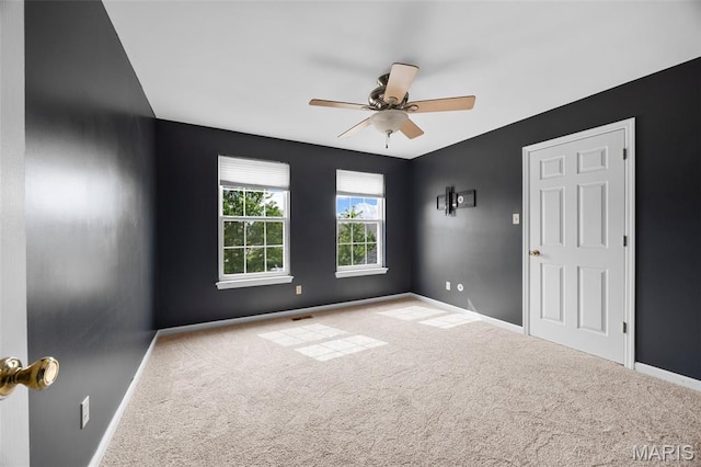 12 Lambeth Ln Unit 11B, Dardenne Prairie, MO 63368 - carpeted spare room with ceiling fan and baseboards