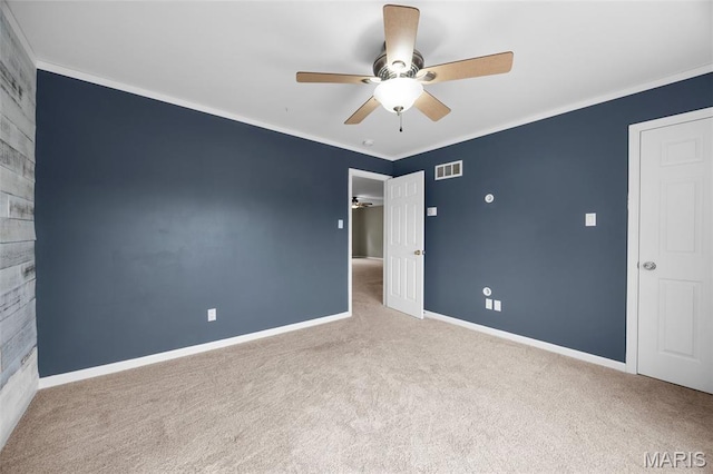12 Lambeth Ln Unit 11B, Dardenne Prairie, MO 63368 - empty room with carpet floors, ceiling fan, baseboards, and crown molding