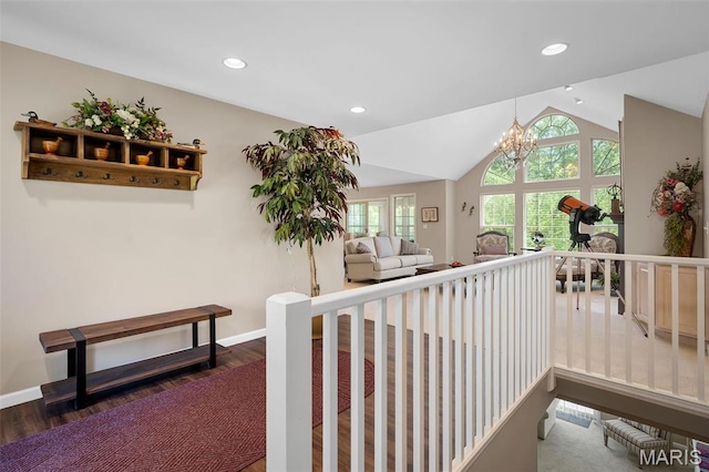 1189 Turnberry Dr, Innsbrook, MO 63390 - hall with vaulted ceiling, dark wood-style floors, a chandelier, recessed lighting, and baseboards