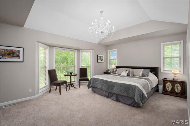 1189 Turnberry Dr, Innsbrook, MO 63390 - carpeted bedroom featuring lofted ceiling, a chandelier, multiple windows, and baseboards