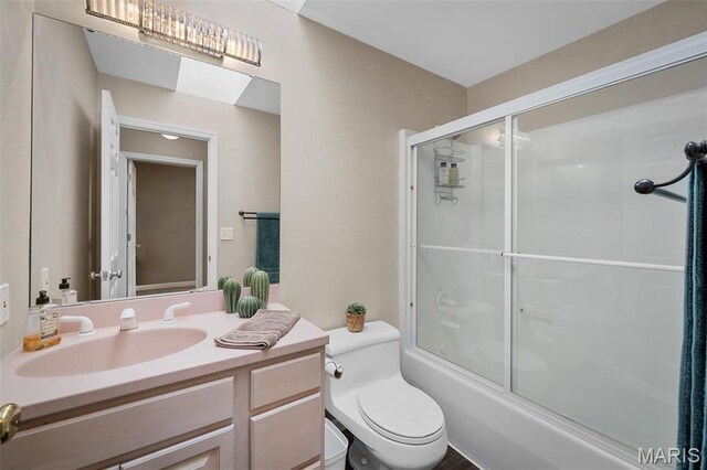 1189 Turnberry Dr, Innsbrook, MO 63390 - full bath with toilet, vanity, and combined bath / shower with glass door