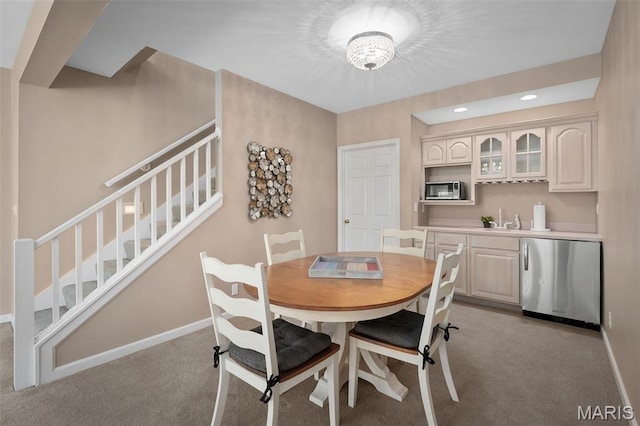 1189 Turnberry Dr, Innsbrook, MO 63390 - dining area with stairway, light colored carpet, baseboards, and recessed lighting