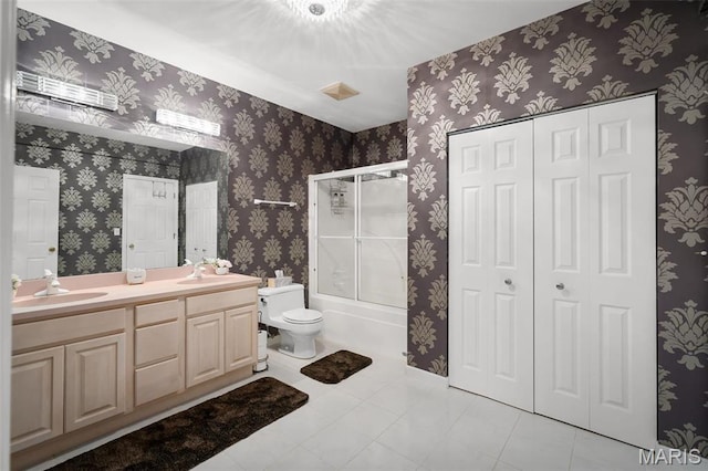 1189 Turnberry Dr, Innsbrook, MO 63390 - full bathroom with double vanity, toilet, bath / shower combo with glass door, and tile patterned flooring