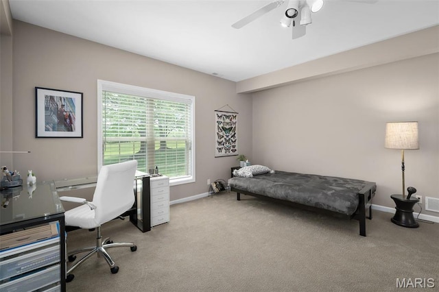 1189 Turnberry Dr, Innsbrook, MO 63390 - carpeted bedroom featuring baseboards, an office area, and a ceiling fan