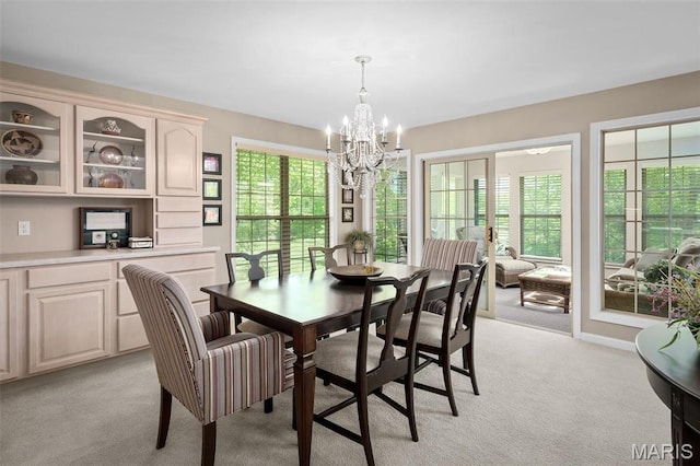 1189 Turnberry Dr, Innsbrook, MO 63390 - dining space featuring a chandelier and light colored carpet