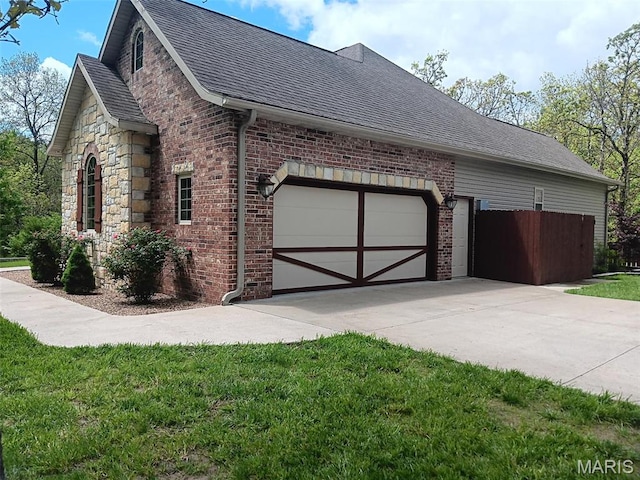 24473 Remington, Lebanon, MO 65536 - view of side of property featuring concrete driveway, brick siding, roof with shingles, an attached garage, and a yard