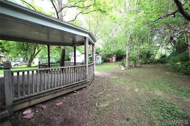 408 S A St, Farmington, MO 63640 - view of yard with a storage unit and a wooden deck