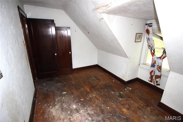 408 S A St, Farmington, MO 63640 - additional living space with vaulted ceiling and baseboards