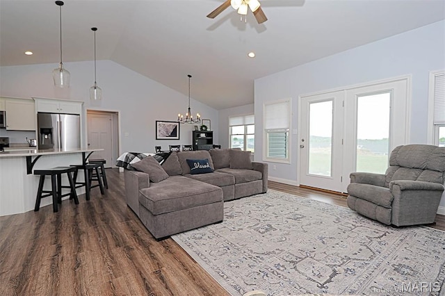 108 Buford Mountain Rd, Farmington, MO 63640 - living room with dark wood finished floors, vaulted ceiling, a ceiling fan, and a chandelier
