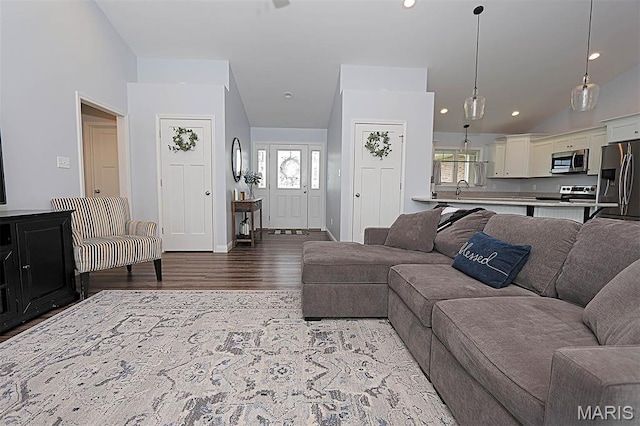 108 Buford Mountain Rd, Farmington, MO 63640 - living area with healthy amount of natural light, wood finished floors, recessed lighting, baseboards, and vaulted ceiling