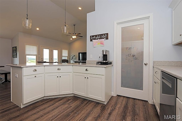 108 Buford Mountain Rd, Farmington, MO 63640 - kitchen featuring dark wood-style flooring, ceiling fan, a peninsula, white cabinetry, and hanging light fixtures