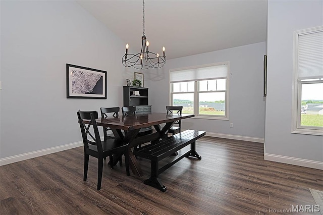 108 Buford Mountain Rd, Farmington, MO 63640 - dining area featuring a chandelier, dark wood-style flooring, baseboards, and lofted ceiling