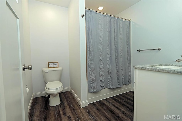 108 Buford Mountain Rd, Farmington, MO 63640 - full bath featuring wood finished floors, toilet, vanity, and baseboards