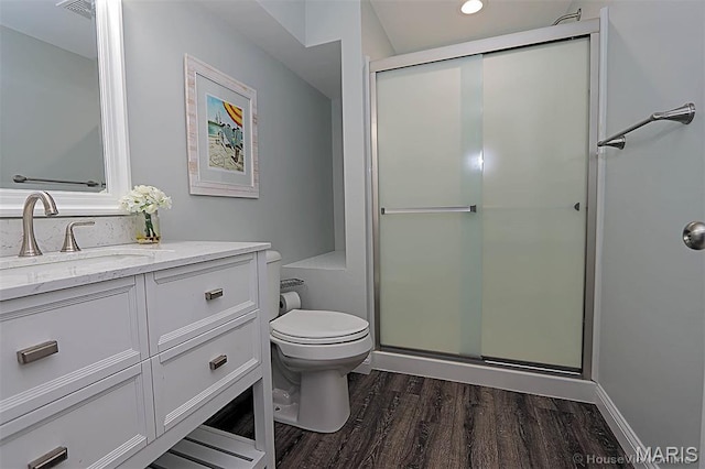 108 Buford Mountain Rd, Farmington, MO 63640 - full bathroom featuring toilet, wood finished floors, vanity, and a shower stall