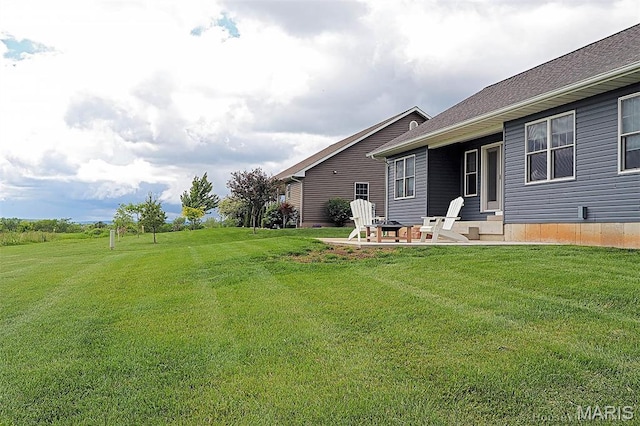 108 Buford Mountain Rd, Farmington, MO 63640 - view of grassy yard featuring a patio and a fire pit