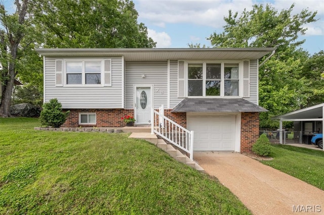 split foyer home with a front lawn, driveway, brick siding, and an attached garage