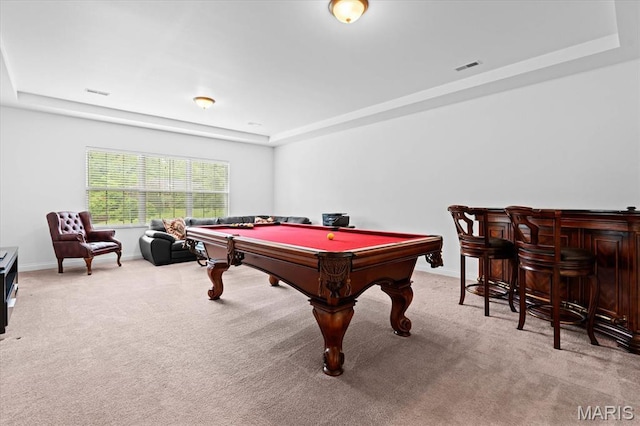 playroom with a raised ceiling, light colored carpet, billiards, baseboards, and a bar
