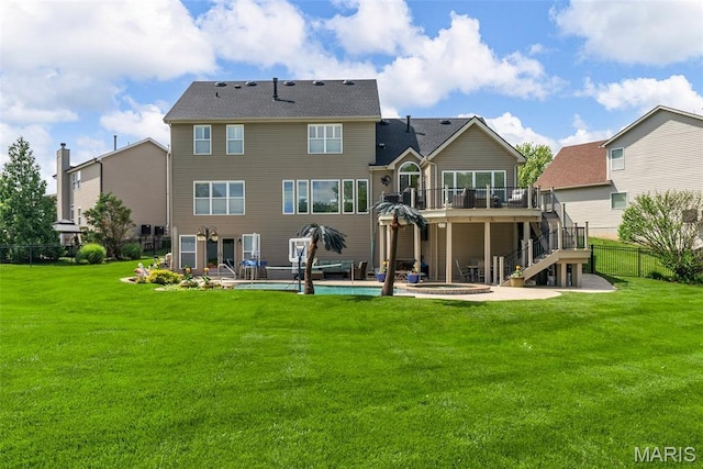 rear view of property with a patio, stairway, and a wooden deck