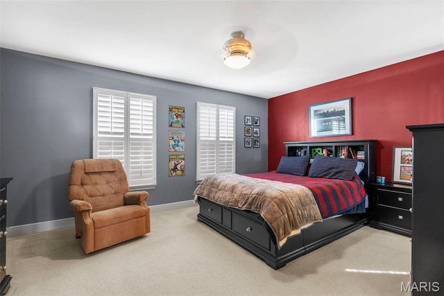 carpeted bedroom with baseboards
