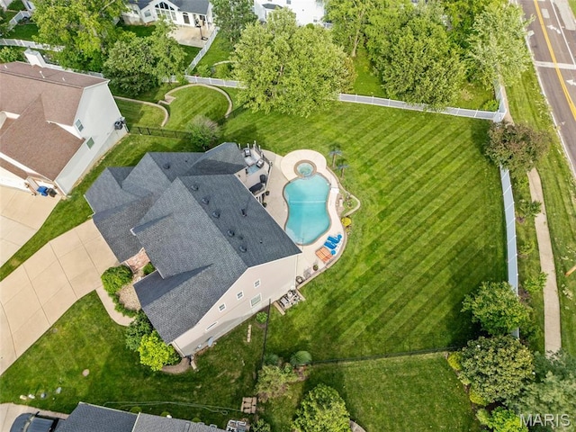 aerial overview of property's location with a pool area