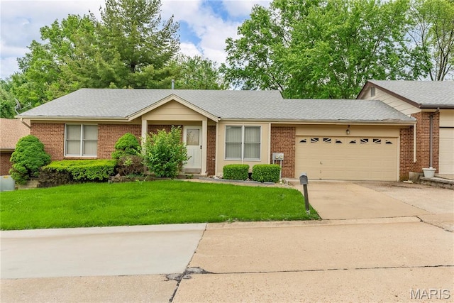 2 Tarpon Ct, Florissant, MO 63033 - ranch-style home featuring an attached garage, concrete driveway, brick siding, and a front lawn