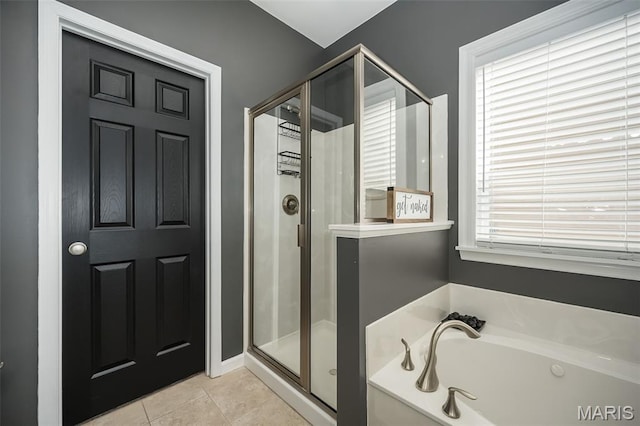 1119 Maywood Dr, Eureka, MO 63025 - full bath featuring a stall shower, a bath, and tile patterned floors