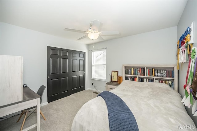 1119 Maywood Dr, Eureka, MO 63025 - carpeted bedroom with a closet, ceiling fan, and a desk