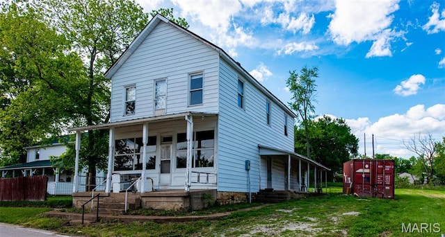 1085 Frisco Dr, Catawissa, MO 63015 - view of front of property with a porch and a front yard