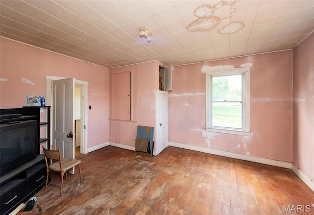1085 Frisco Dr, Catawissa, MO 63015 - unfurnished living room with hardwood / wood-style floors and baseboards
