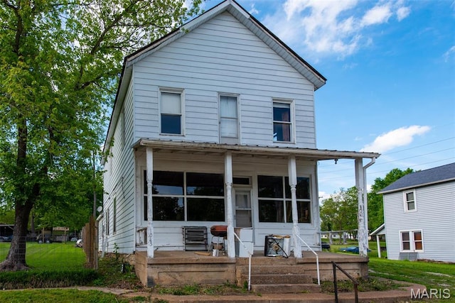 1085 Frisco Dr, Catawissa, MO 63015 - view of front of home with a sunroom