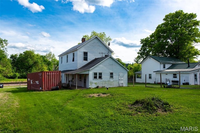 1085 Frisco Dr, Catawissa, MO 63015 - rear view of property with a chimney