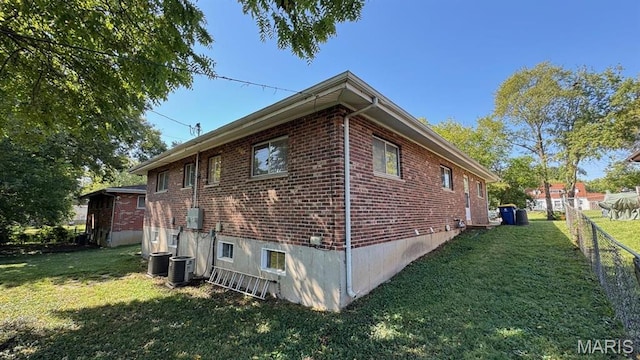 4028 Esseldale Dr, Saint Ann, MO 63074 - view of side of property featuring brick siding and central air condition unit