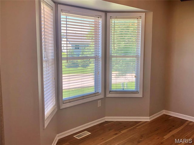 1215 Brookstone Ln, Lake St Louis, MO 63367 - detailed view of baseboards and wood finished floors